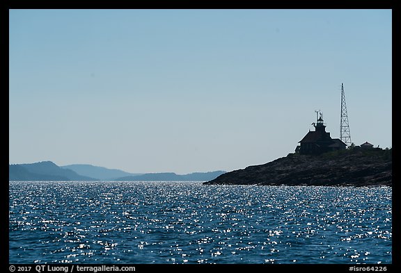 Lighthouse on Passage Island with Isle Royale in the distance. Isle Royale National Park, Michigan, USA.