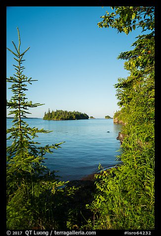 Shaw Island framed by trees of Tookers Island. Isle Royale National Park, Michigan, USA.