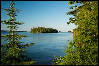 Islands of archipelago framed by trees from Tookers Island. Isle Royale National Park ( color)