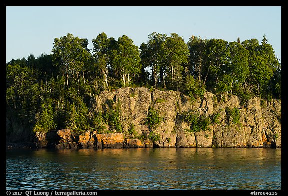 Sea cliffs and trees, late afternoon. Isle Royale National Park (color)