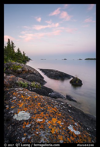 Lichen-colored rocks on Rock Harbor shore, sunset. Isle Royale National Park (color)