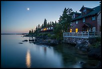 Rock Harbor Lodge and moon at dusk. Isle Royale National Park, Michigan, USA.