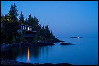 Rock Harbor Lodge at night with di Rock Harbor Lodge and moon at duskstant ship in shipping lane in front of Passage Island. Isle Royale National Park ( color)