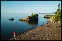 Visitor looking, Mott Island. Isle Royale National Park, Michigan, USA.