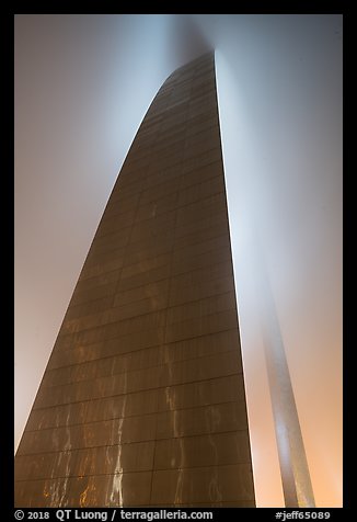 Profile view of Gateway Arch with top in clouds at night. Gateway Arch National Park (color)