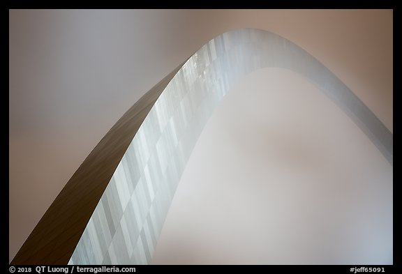 Gateway Arch in fog at night. Gateway Arch National Park, St Louis, Missouri, USA.