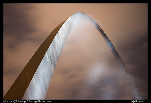 Gateway Arch and clouds at night. Gateway Arch National Park, St Louis, Missouri, USA.