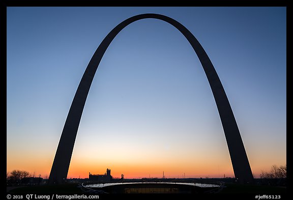 Arch at sunrise with curve of new visitor center roof. Gateway Arch National Park (color)