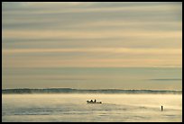 Boaters in fog, early morning, Kabetogama Lake. Voyageurs National Park ( color)