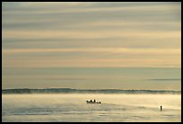Boaters in fog, early morning, Kabetogama Lake. Voyageurs National Park ( color)