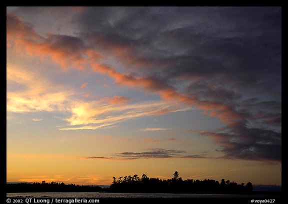 Clouds and islet at sunset, Kabetogama Lake. Voyageurs National Park, Minnesota, USA.