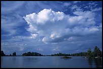 Bright cloud above Rainy lake. Voyageurs National Park, Minnesota, USA. (color)