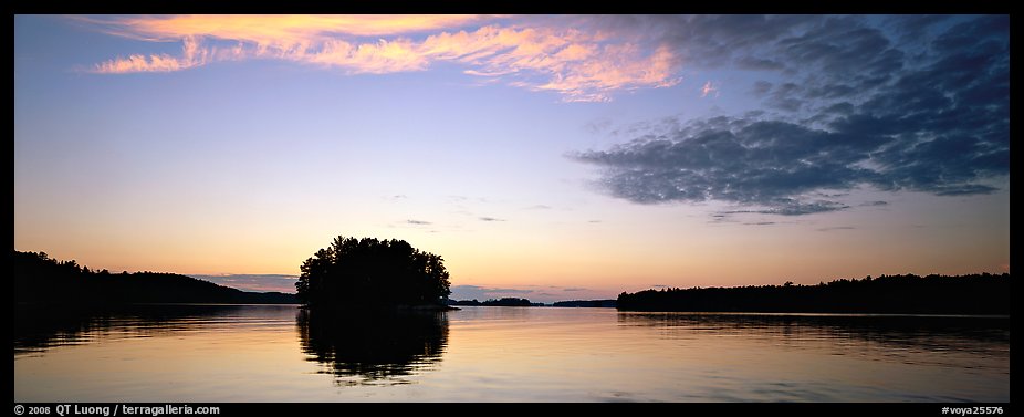 North woods tree-covered isled at sunset. Voyageurs National Park, Minnesota, USA.