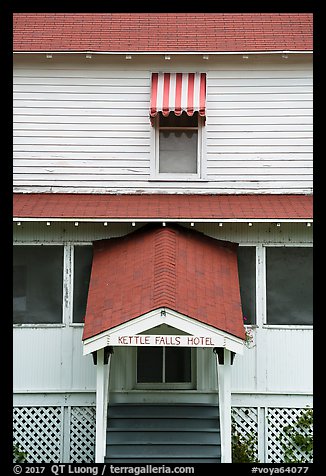 Kettle Falls Hotel door and window with red and white stripes awning. Voyageurs National Park (color)