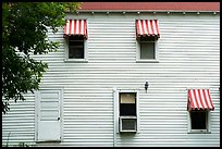 Kettle Falls Hotel wall with with red and white stripes awnings. Voyageurs National Park ( color)