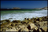 Surf foam and rocks, Cuyler Harbor, mid-day, San Miguel Island. Channel Islands National Park, California, USA. (color)