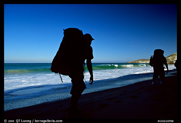 Backpackers on beach, Cuyler harbor, San Miguel Island. Channel Islands National Park, California, USA.