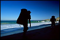 Backpackers on beach, Cuyler harbor, San Miguel Island. Channel Islands National Park, California, USA.