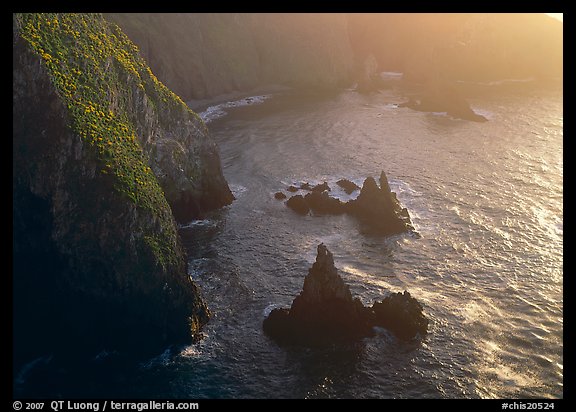 Cliffs and pointed rocks, Cathedral Cove, late afternoon, Anacapa Island. Channel Islands National Park, California, USA.