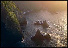 Cliffs and pointed rocks, Cathedral Cove, late afternoon, Anacapa Island. Channel Islands National Park, California, USA. (color)