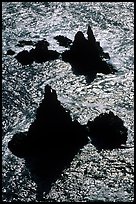 Backlit rocks and water, Cathedral Cove, Anacapa, late afternoon. Channel Islands National Park, California, USA.