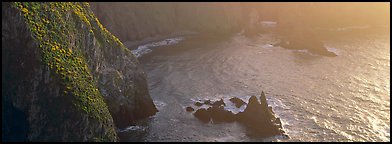 Steep cove with glittering water, Anacapa Island. Channel Islands National Park (Panoramic color)