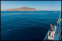 Woman on boat cruising towards Annacapa Island. Channel Islands National Park, California, USA. (color)