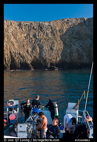 Dive boat and cliffs, Annacapa Island. Channel Islands National Park, California, USA.