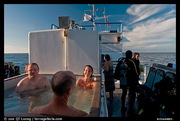 Soaking in hot tub on diving boat, Annacapa Island. Channel Islands National Park, California, USA.