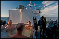 Soaking in hot tub on diving boat, Annacapa Island. Channel Islands National Park, California, USA.