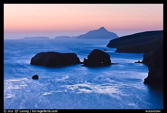 Rocks and Anacapa Islands a dawn, Santa Cruz Island. Channel Islands National Park, California, USA.