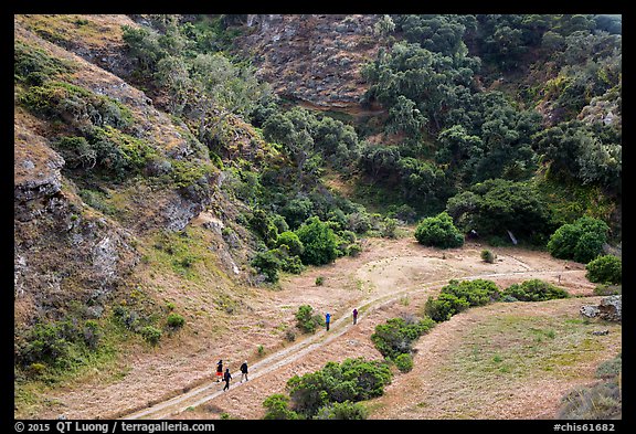 Hikers at Lobo Canyon entrance, Santa Rosa Island. Channel Islands National Park, California, USA.