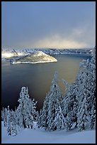 Lake and Wizard Island, winter sunrise. Crater Lake National Park, Oregon, USA.