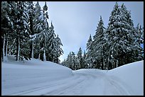 Snow-covered road. Crater Lake National Park, Oregon, USA.