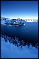 Wizard Island and lake in winter, late afternoon. Crater Lake National Park, Oregon, USA.