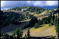 Volcanic hills and pine trees. Crater Lake National Park, Oregon, USA.