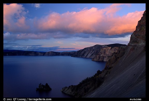 Phantom ship and lake seen from Sun Notch, sunset. Crater Lake National Park, Oregon, USA.