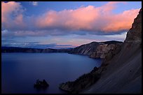 Phantom ship and lake seen from Sun Notch, sunset. Crater Lake National Park, Oregon, USA.