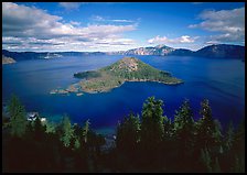 Wide view of lake with Wizard Island, afternoon. Crater Lake National Park, Oregon, USA.