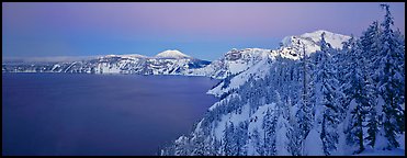 Pristine winter dusk scene. Crater Lake National Park (Panoramic color)