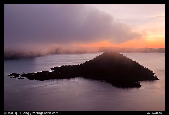 Cloud above Wizard Island at dawn. Crater Lake National Park, Oregon, USA.