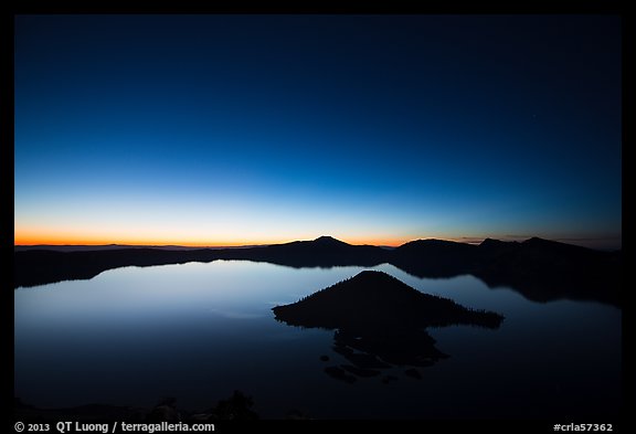 Wide view of lake with dawn on eastern horizon. Crater Lake National Park (color)