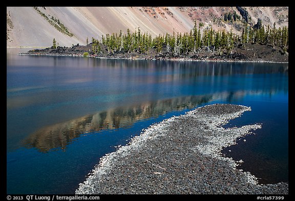 Lava rocks and reflections in Fumarole Bay, Wizard Island. Crater Lake National Park (color)