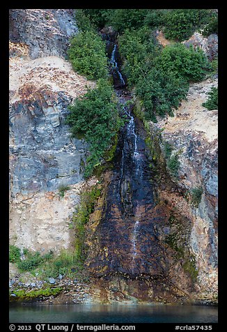 Chaski Slide waterfall flowing into lake. Crater Lake National Park (color)