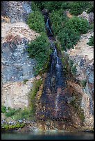 Chaski Slide waterfall flowing into lake. Crater Lake National Park ( color)