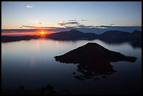 Sun rising below cloud band. Crater Lake National Park ( color)