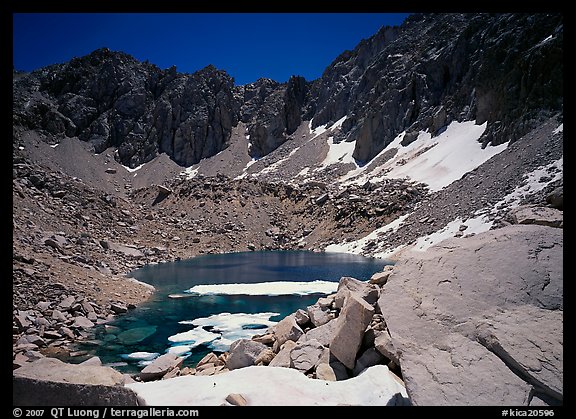 Alpine lake in early summer. Kings Canyon National Park, California, USA.