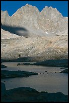 North Palissade rising above lake, Dusy Basin. Kings Canyon National Park, California, USA.