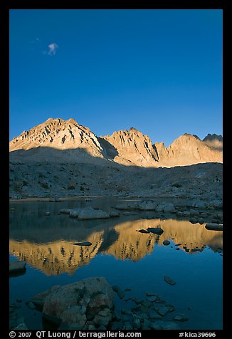 Palissades chain reflected in lake, Dusy Basin. Kings Canyon National Park, California, USA.