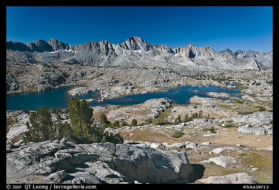 Alpine terrain, lakes and mountains, morning, Dusy Basin. Kings Canyon National Park, California, USA.